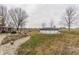 Expansive backyard with above-ground pool and a large open grassy area at 362 1400 N, Summitville, IN 46070