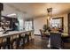 Well-lit kitchen showcasing the breakfast bar area and stylish seating at 362 1400 N, Summitville, IN 46070