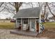 Charming shed featuring a small porch and creative decor, perfect for a relaxing getaway at 362 1400 N, Summitville, IN 46070