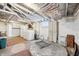 Unfinished basement featuring a washer, dryer, and painted walls presents renovation potential at 403 S Ohio St, Sheridan, IN 46069