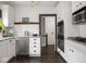 Modern kitchen with stainless steel appliances, white cabinetry, and subway tile backsplash at 4220 Sunset Ave, Indianapolis, IN 46208