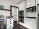 Contemporary kitchen design with built-in oven and microwave, paired with white cabinets at 4220 Sunset Ave, Indianapolis, IN 46208