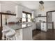 Well-lit kitchen featuring granite countertops, white subway tile, and stainless steel appliances at 4220 Sunset Ave, Indianapolis, IN 46208