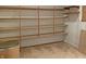 Unfinished basement with white walls and multiple shelves at 5746 Overcrest Dr, Indianapolis, IN 46237