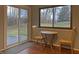 Cozy breakfast nook with outdoor view; patio doors leads to outside deck at 5746 Overcrest Dr, Indianapolis, IN 46237