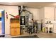 Furnace Room with laundry area, furnace, water heater and softener at 5746 Overcrest Dr, Indianapolis, IN 46237