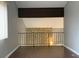 Cozy living room with fireplace and hardwood floors at 5746 Overcrest Dr, Indianapolis, IN 46237