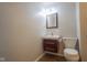 Powder room with modern fixtures, including a vanity and toilet, providing a functional space at 7302 N Banta Rd, Bargersville, IN 46106