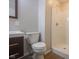 Bathroom featuring a single stall shower, toilet, and vanity providing all essential functions at 7302 N Banta Rd, Bargersville, IN 46106