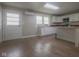 Updated kitchen featuring white cabinets, a breakfast bar, and stainless steel appliances at 7302 N Banta Rd, Bargersville, IN 46106