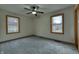Bedroom with carpet flooring and two windows at 770 Berkley Dr, Fortville, IN 46040