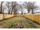 Backyard with newly installed wooden fence at 1133 Olive St, Indianapolis, IN 46203