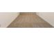 Carpeted hallway with neutral tones and minimalist design at 1133 Olive St, Indianapolis, IN 46203