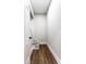 Hallway with hardwood floors, with carpeted steps at 1133 Olive St, Indianapolis, IN 46203