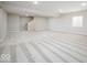 Unfinished basement offering a blank canvas for customization with neutral walls and ample space at 19995 Meadow Neck Rd, Westfield, IN 46074