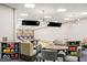 Modern bowling alley with comfortable seating, decor and colorful bowling balls at 19995 Meadow Neck Rd, Westfield, IN 46074