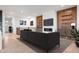 Spacious living room with fireplace, wood accents, light hardwood floors, and recessed lighting at 20017 Old Dock Rd, Westfield, IN 46074