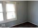 Bedroom with a large window and neutral paint at 2029 Laurel St, Indianapolis, IN 46203