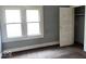Bedroom with gray walls and natural light at 2029 Laurel St, Indianapolis, IN 46203