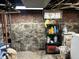 Unfinished basement, brick foundation, and small window at 214 S Howard St, Oxford, IN 47971