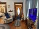 Inviting living room featuring a cozy recliner and entertainment setup at 214 S Howard St, Oxford, IN 47971