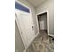 Welcoming entryway featuring wood-look floors, neutral walls, and a bright white front door for a modern aesthetic at 253 Darrough Dr, Greenwood, IN 46143