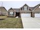 Charming single-Gathering home boasting a brick facade, complemented by a two-car garage and well-maintained lawn at 253 Darrough Dr, Greenwood, IN 46143