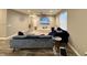 Cozy living room with plush sofas, a TV, and a large window for natural light at 253 Darrough Dr, Greenwood, IN 46143