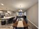 Open-concept living space with eat in bar, perfect for entertaining at 253 Darrough Dr, Greenwood, IN 46143