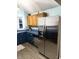 Cozy kitchen featuring stainless steel appliances and ample cabinet storage at 2650 W State Road 252, Flat Rock, IN 47234