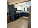 Modern kitchen featuring stainless steel appliances and a stylish backsplash at 2650 W State Road 252, Flat Rock, IN 47234