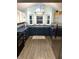 Modern kitchen featuring updated appliances, including a stainless steel refrigerator at 2650 W State Road 252, Flat Rock, IN 47234