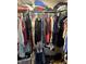 Spacious walk-in closet with ample storage racks and hanging rods for maximum organization at 2650 W State Road 252, Flat Rock, IN 47234