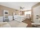 Spacious main bedroom with white furniture, ceiling fan, double-hung windows, and carpet at 411 Red Tail Ln, Indianapolis, IN 46241