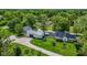 Overhead view of a home with a metal roof, large garage, and a vast green yard at 4131 N County Road 500 E, Danville, IN 46122
