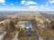 Expansive aerial view of home on a spacious lot with a mix of trees and open fields at 4131 N County Road 500 E, Danville, IN 46122