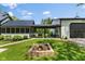 Spacious backyard with fire pit, screen porch, and connected garage at 4131 N County Road 500 E, Danville, IN 46122