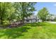 This yard provides a fire pit and a table and chairs for ultimate outdoor enjoyment at 4131 N County Road 500 E, Danville, IN 46122