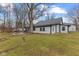 Exterior view of home with an outdoor patio and beautifully maintained yard at 4131 N County Road 500 E, Danville, IN 46122