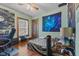 View of the bedroom featuring hardwood floors, ceiling fan, and a window at 4131 N County Road 500 E, Danville, IN 46122