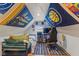 Cozy bedroom featuring a bed, a desk, and a ceiling fan at 4131 N County Road 500 E, Danville, IN 46122