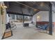Inviting covered patio featuring comfortable seating and a luxurious hot tub for relaxation at 4131 N County Road 500 E, Danville, IN 46122