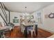 Dining room featuring hardwood floors, a view to the living room and lots of natural light at 4131 N County Road 500 E, Danville, IN 46122