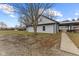 Exterior elevation view with a walkway and a covered parking area for multiple vehicles at 4131 N County Road 500 E, Danville, IN 46122