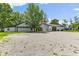 This lovely farmhouse-style home has a well maintained lawn and an outbuilding garage at 4131 N County Road 500 E, Danville, IN 46122