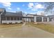 Wide angle view of the backyard featuring a firepit and an oversized garage at 4131 N County Road 500 E, Danville, IN 46122