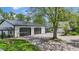 Spacious three-car garage with black doors and ample driveway parking at 4131 N County Road 500 E, Danville, IN 46122