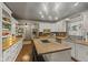 Bright kitchen featuring a large island, stainless steel appliances, and plenty of storage at 4131 N County Road 500 E, Danville, IN 46122