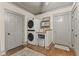 Laundry room featuring a washer and dryer, shelving, and storage space at 4131 N County Road 500 E, Danville, IN 46122