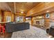 Spacious living room with wood paneling, fireplace, and ample seating space at 4131 N County Road 500 E, Danville, IN 46122